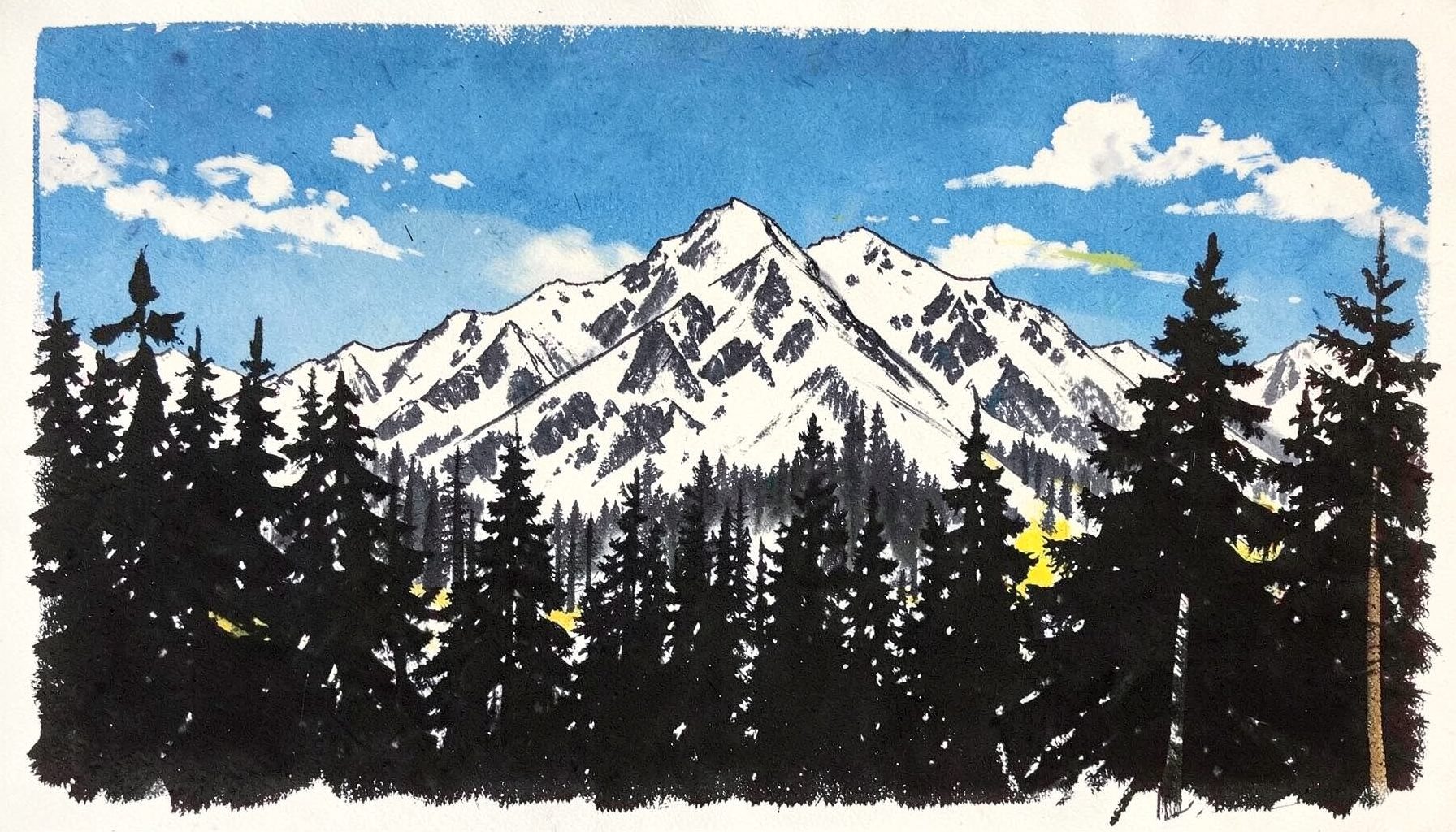 Snow-dusted mountain peaks rising behind dense pine forest, crisp blue sky with scattered clouds